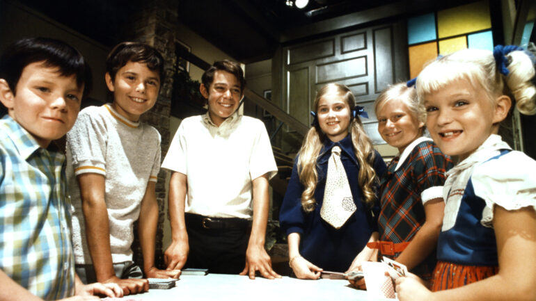 Still image of the Brady Bunch Kids Mike Lookinland, Christopher Knight, Barry Williams, Maureen McCormick, Eve Plumb, Susan Olsen on-set, on Season 1, ep. 115, which aired January 9, 1970, Where are they now?