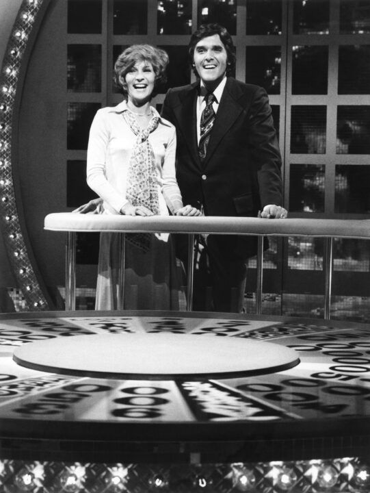 WHEEL OF FORTUNE, (from left): co-host Susan Stafford, host Chuck Woolery, (1975), 1975-.