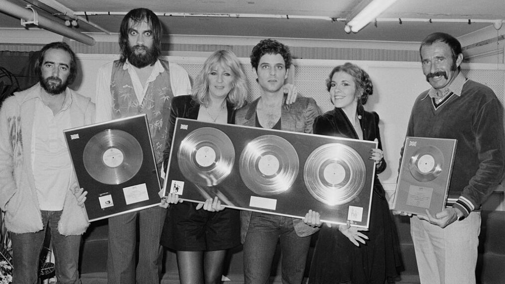 Anglo-American rock group Fleetwood Mac with awards for British sales of their albums 'Rumours' and Tusk', Wembley Arena, London, June 1980. The band are backstage at one of six shows between 20th - 27th June. Left to right: John McVie, Mick Fleetwood, Christine McVie, Lindsey Buckingham and Stevie Nicks
