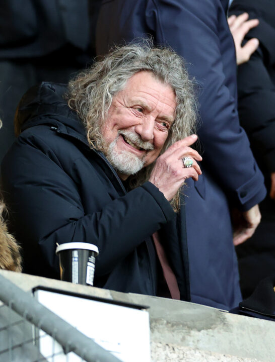 WOLVERHAMPTON, ENGLAND - APRIL 24: Robert Plant, former lead singer with Led Zeppelin rock band, and Wolverhampton Wanderers supporter looks on during the Premier League match between Wolverhampton Wanderers and AFC Bournemouth at Molineux on April 24, 2024 in Wolverhampton, England. (Photo by David Rogers/Getty Images)