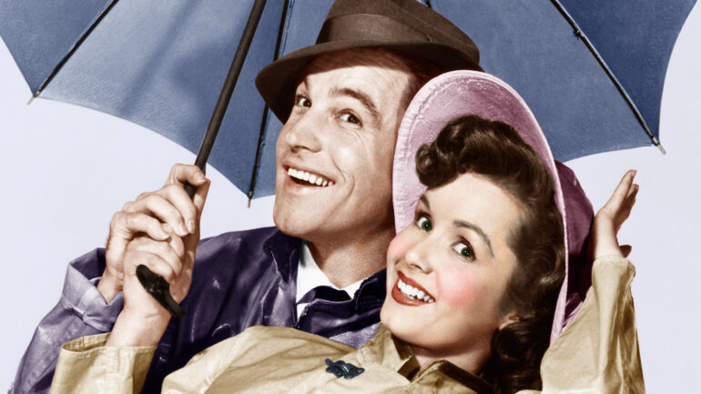 SINGIN' IN THE RAIN, from left: Gene Kelly, Debbie Reynolds, 1952