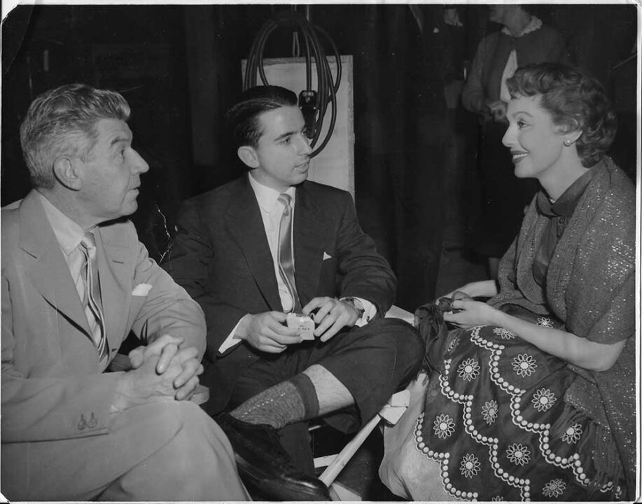 Norman Brokaw and Kim Novak and another man