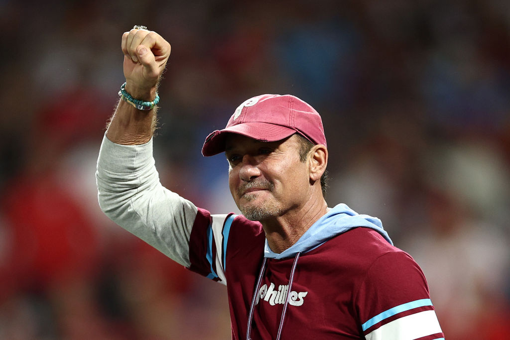 Musician Tim McGraw cheers during Game One of the Championship Series between the Philadelphia Phillies and the Arizona Diamondbacks at Citizens Bank Park on October 16, 2023 in Philadelphia, Pennsylvania