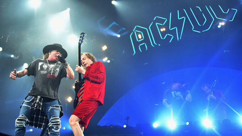 Singer Axl Rose (L) and guitarist Angus Young of AC/DC perform during the AC/DC Rock Or Bust Tour at Madison Square Garden on September 14, 2016 in New York City