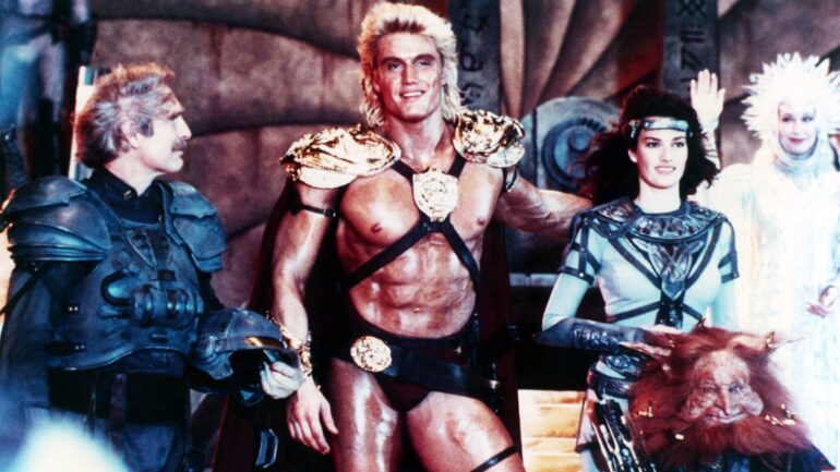 MASTERS OF THE UNIVERSE, from left: Jon Cypher, Dolph Lundgren, Chelsea Field, Billy Barty (front), Christina Pickles, 1987,