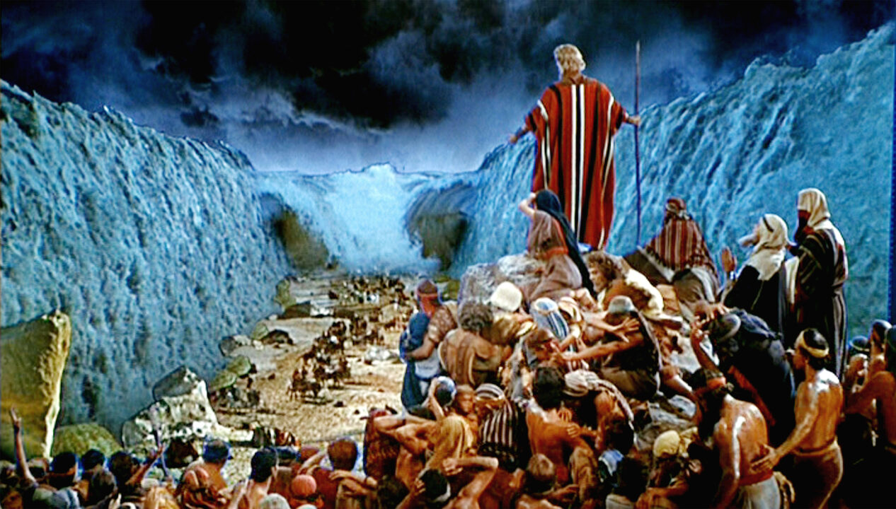 LOS ANGELES - OCTOBER 5: The epic movie "The Ten Commandments", directed by Cecil B. DeMille. Seen here, Charlton Heston as Moses while the Red Sea engulfs the Pharaoh's army. Initial theatrical release October 5, 1956.