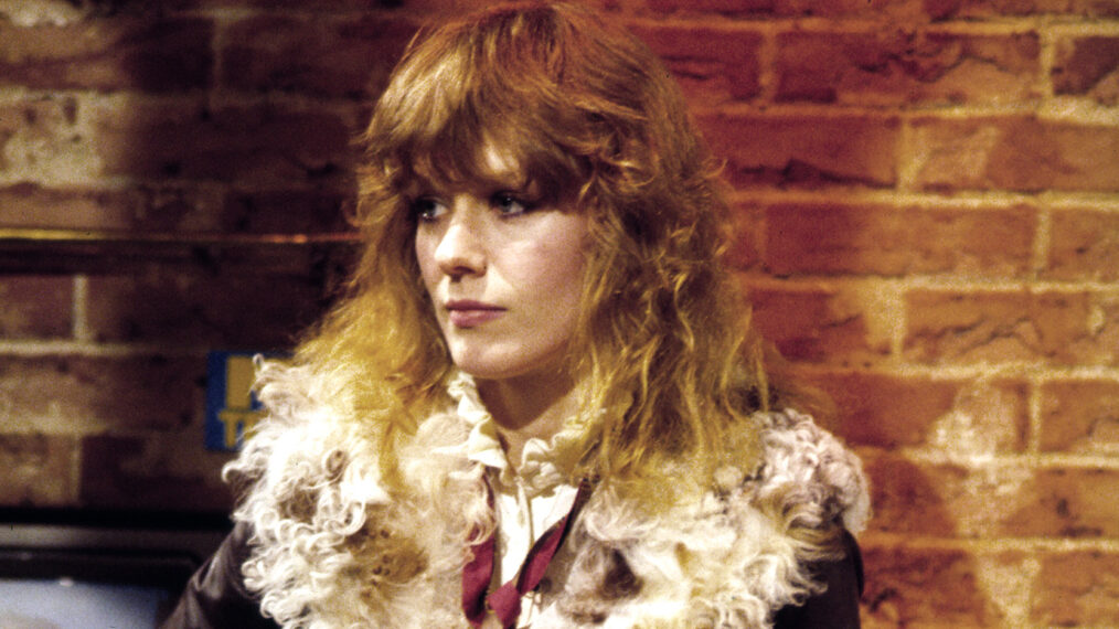 View of American Rock musician Nancy Wilson, of the group Heart, as she plays a Fender Telecaster electric guitar, seated on a stereo speaker, during an interview on MTV at Teletronic Studios, New York, New York, April 22, 1982.