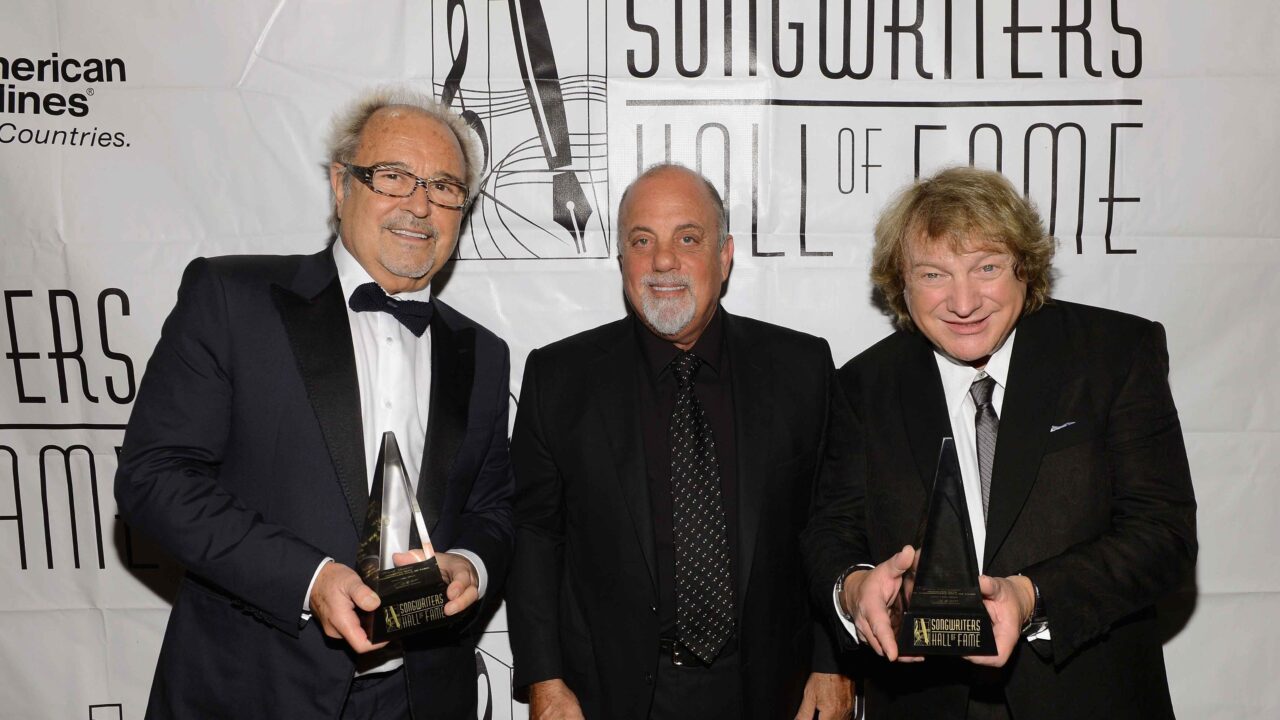 NEW YORK, NY - JUNE 13: Mick Jones, Lou Gramm of Foreigner and Billy Joel (C) attend the Songwriters Hall of Fame 44th Annual Induction and Awards Dinner at the New York Marriott Marquis on June 13, 2013 in New York City. (Photo by Larry Busacca/Getty Images for Songwriters Hall Of Fame)