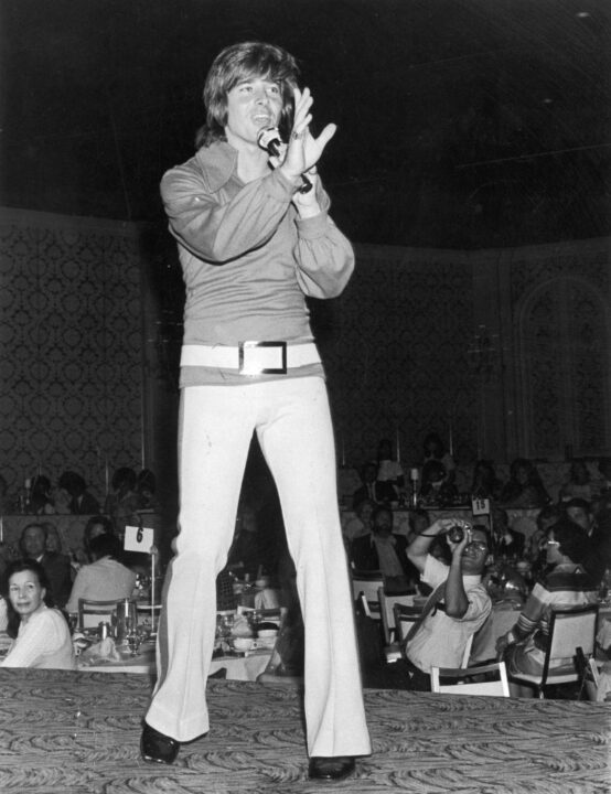 American pop singer and teen idol Bobby Sherman performing on stage at Variety Club event, Hollywood, June 1971.