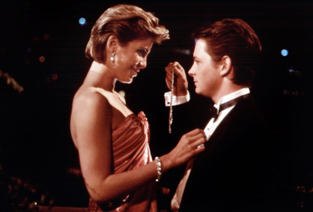 THE SECRET OF MY SUCCESS, from left: Helen Slater, Michael J. Fox, 1987,