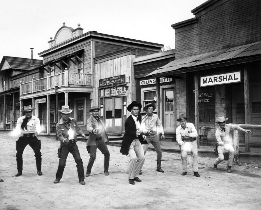 Warner Brothers publicity shot featuring the stars of their television westerns from left: Wayde Preston of COLT .45, Will Hutchins of SUGARFOOT, Jack Kelly of MAVERICK, James Garner of MAVERICK, Ty Hardin of BRONCO, Peter Brown of LAWMAN, John Russell of LAWMAN, ca. 1958
