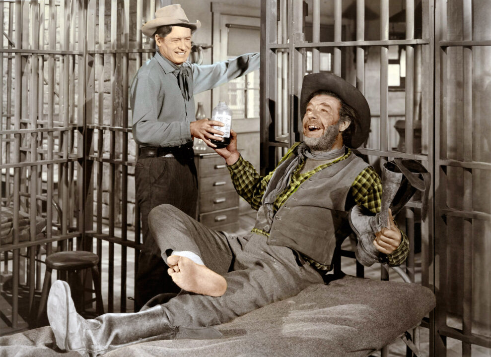 THE BOY FROM OKLAHOMA, from left: Will Rogers Jr., Lon Chaney Jr., 1954