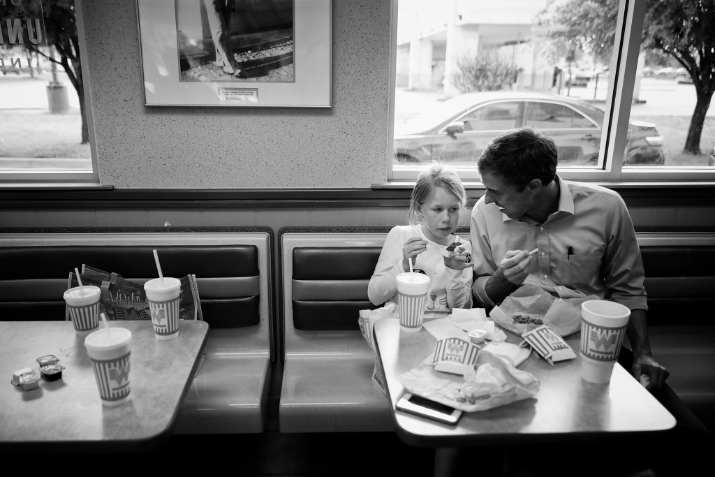 U.S. Senate candidate Rep. Beto O'Rourke (D-TX) takes a quick break from canvassing to have lunch wit his daughter Molly, 10, an the rest of his family and campaign staff at a Whataburger November 3, 2018 in Dallas, Texas. As Election Day approaches, winning swing votes in the suburbs that surround Dallas and Fort Worth will be crucial in a statewide victory for O"u2019Rourke and his opponent incumbent Sen. Ted Cruz (R-TX)