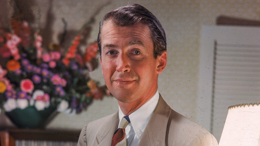 Jimmy Stewart (1908 -1997) seated wearing a tan suit, 1940s.