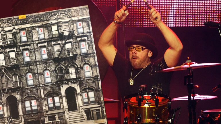 Drummer Jason Bonham, of Jason Bonham's Led Zeppelin Experience performing at The Pantages Theatre on November 23, 2010 in Hollywood, California with Physical Grafaffiti albumn inset