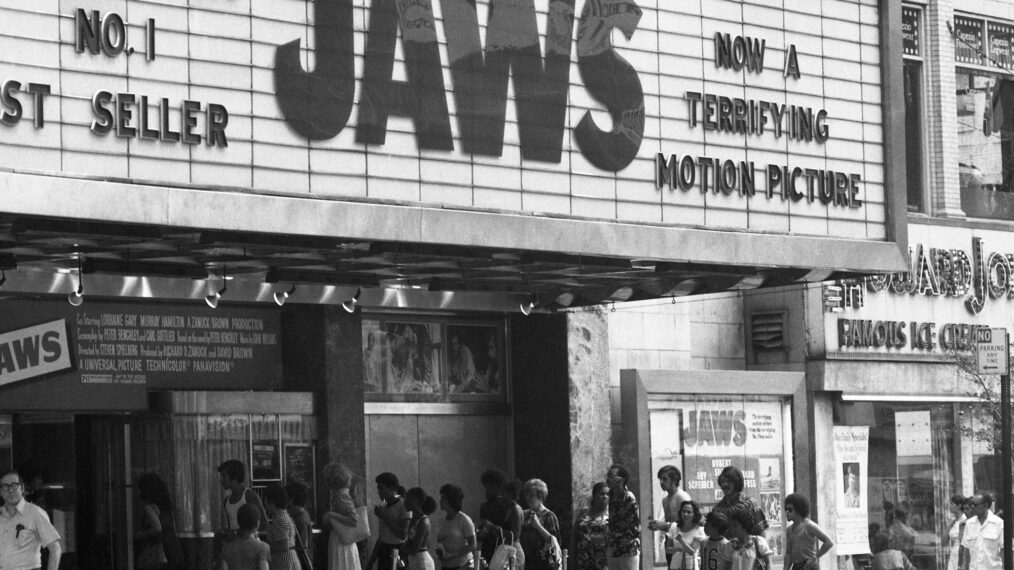 black and white image from 1975 of crowds lined up outside a movie theater to see