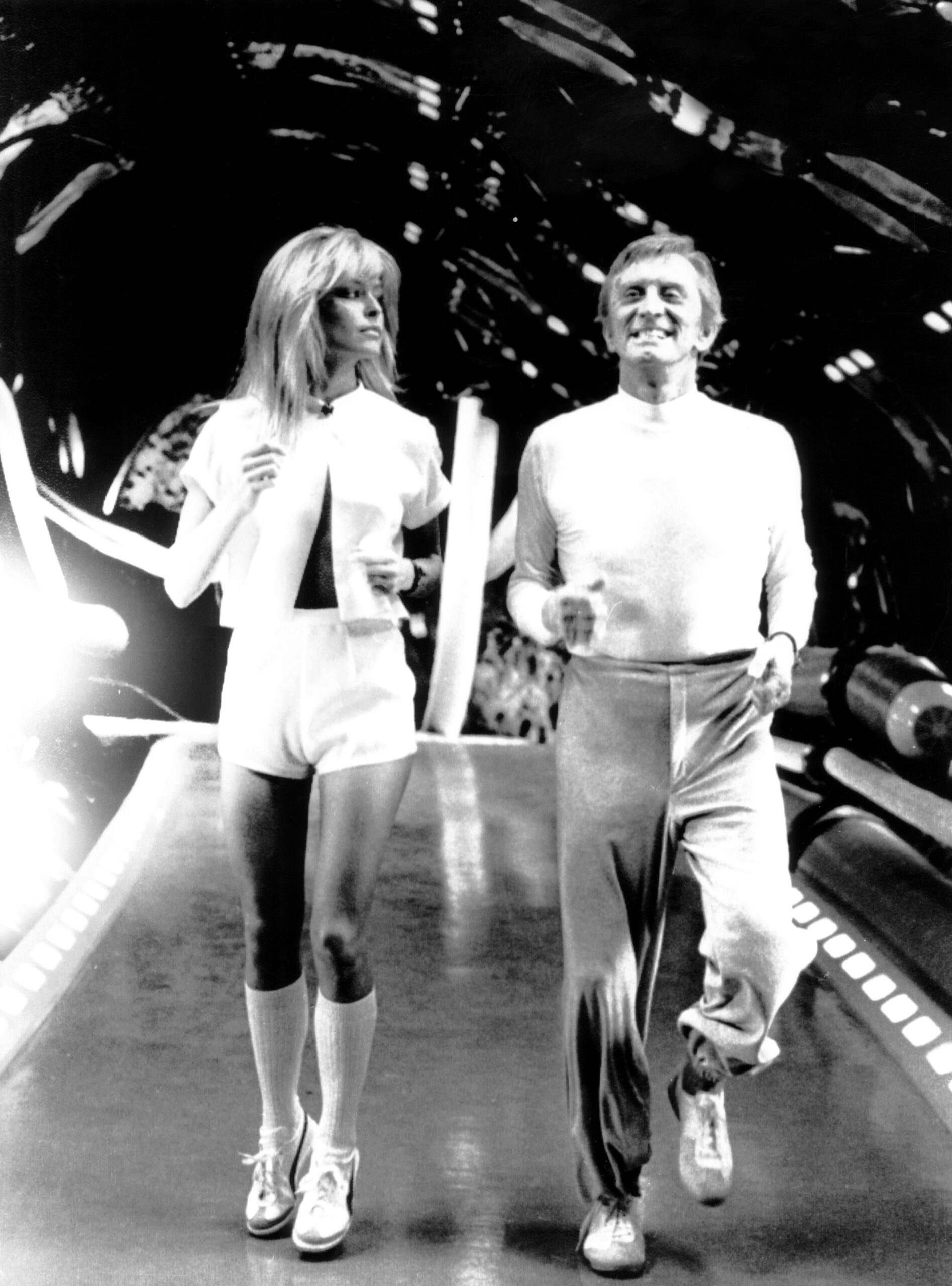 SATURN 3, from left, Farrah Fawcett, Kirk Douglas, exercising on-set, February 1979,