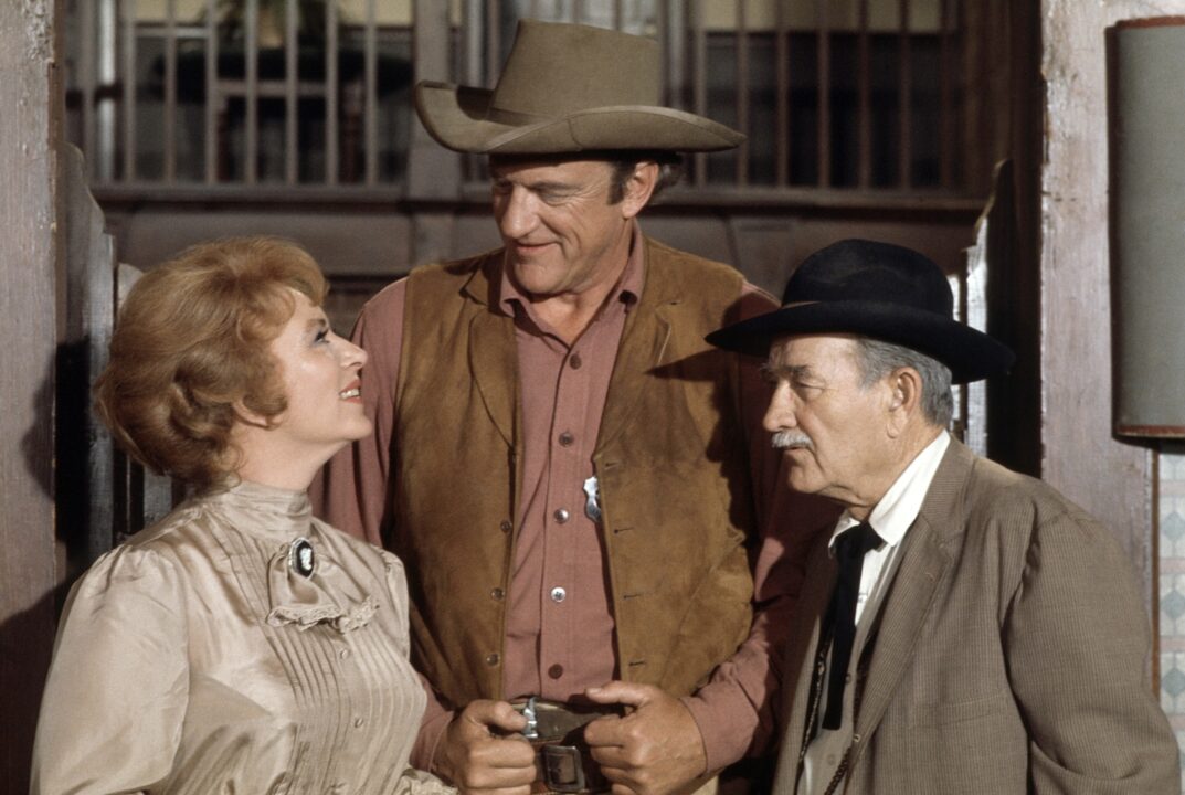 GUNSMOKE, from left: Amanda Blake, James Arness, Milburn Stone, (September 29, 1973), 1955-1975. ph: Lee Green / TV Guide / courtesy Everett Collect