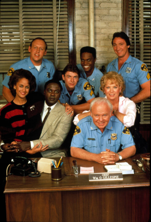 IN THE HEAT OF THE NIGHT, (Back row) David Hart, Hugh O'Connor, Geoffrey Thorne, Alan Autry. (Seated) Anne-Marie Johnson, Howard Rollins, Carroll O'Connor, Lois Nettleton. 1988-94