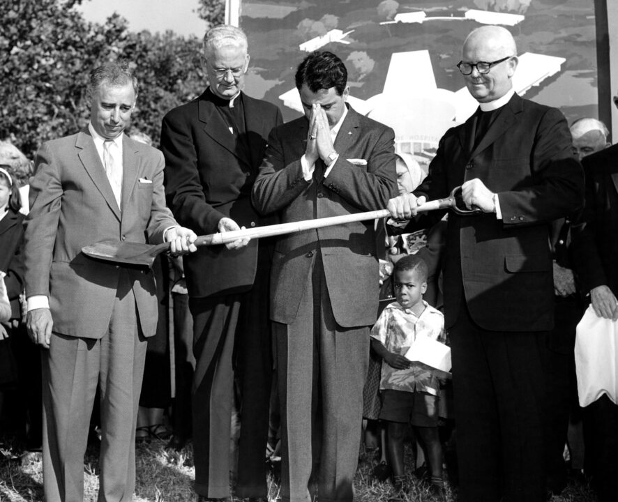 Danny Thomas (center, praying) at the ground breaking of St. Jude Children's Research Hospital, ca. 1960