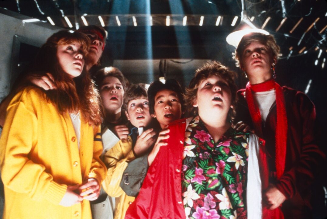 THE GOONIES, from left: Kerri Green, Josh Brolin, Corey Feldman, Sean Astin, Ke Huy Quan (aka Jonathan Ke Quan), Jeff Cohen, Martha Plimpton, 1985.