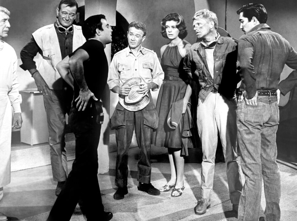 HATARI!, from left, Eduard Franz, John Wayne, Gerard Blain, Red Buttons, Michele Girardon, Hardy Kruger, Valentin de Vargas, 1962