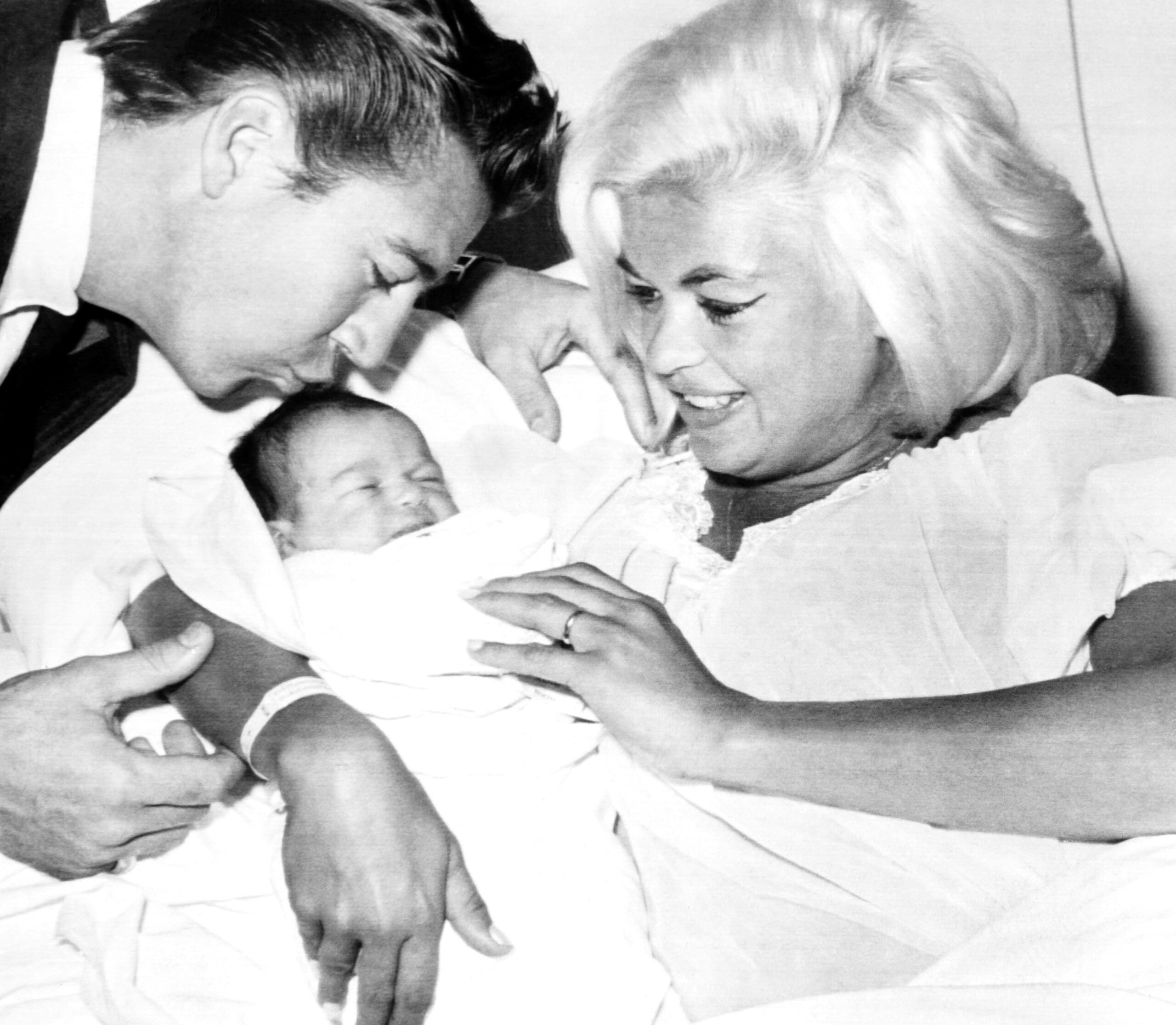 Jayne Mansfield and Mickey Hargitay, with two-day-old daughter Mariska Hargitay, St. John's Hospital, Santa Monica, January 25, 1964