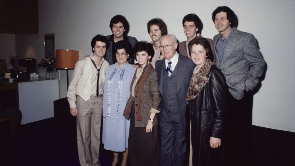 American musical family The Osmonds in London, January 1979. From left to right, they are (front row) Donny, Olive, Marie, George, Jimmy; (back row) Alan, Merrill, Jay and Wayne