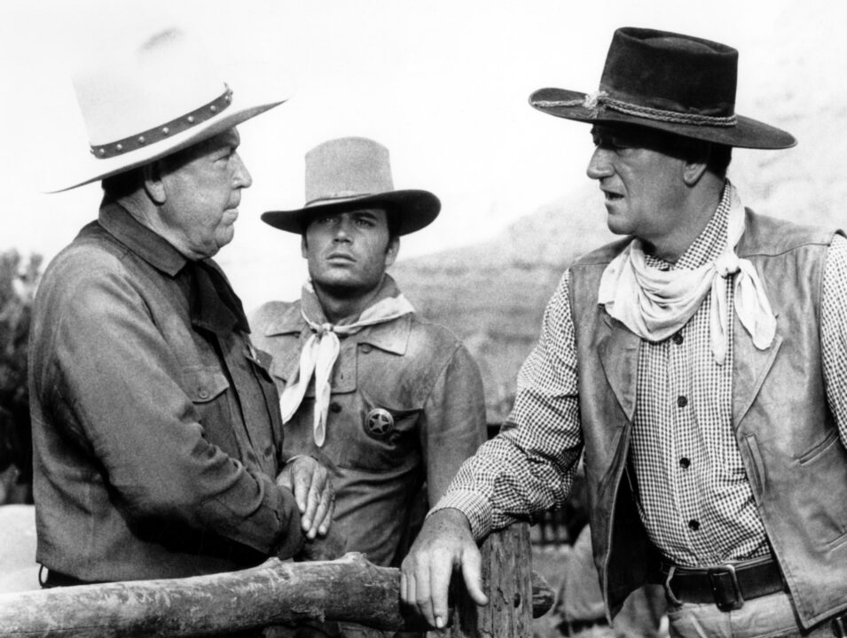 THE COMANCHEROS, from left: Bruce Cabot, Patrick Wayne, John Wayne, 1961, TM and Copyright (c) 20th Century-Fox Film Corp. All Rights Reserved