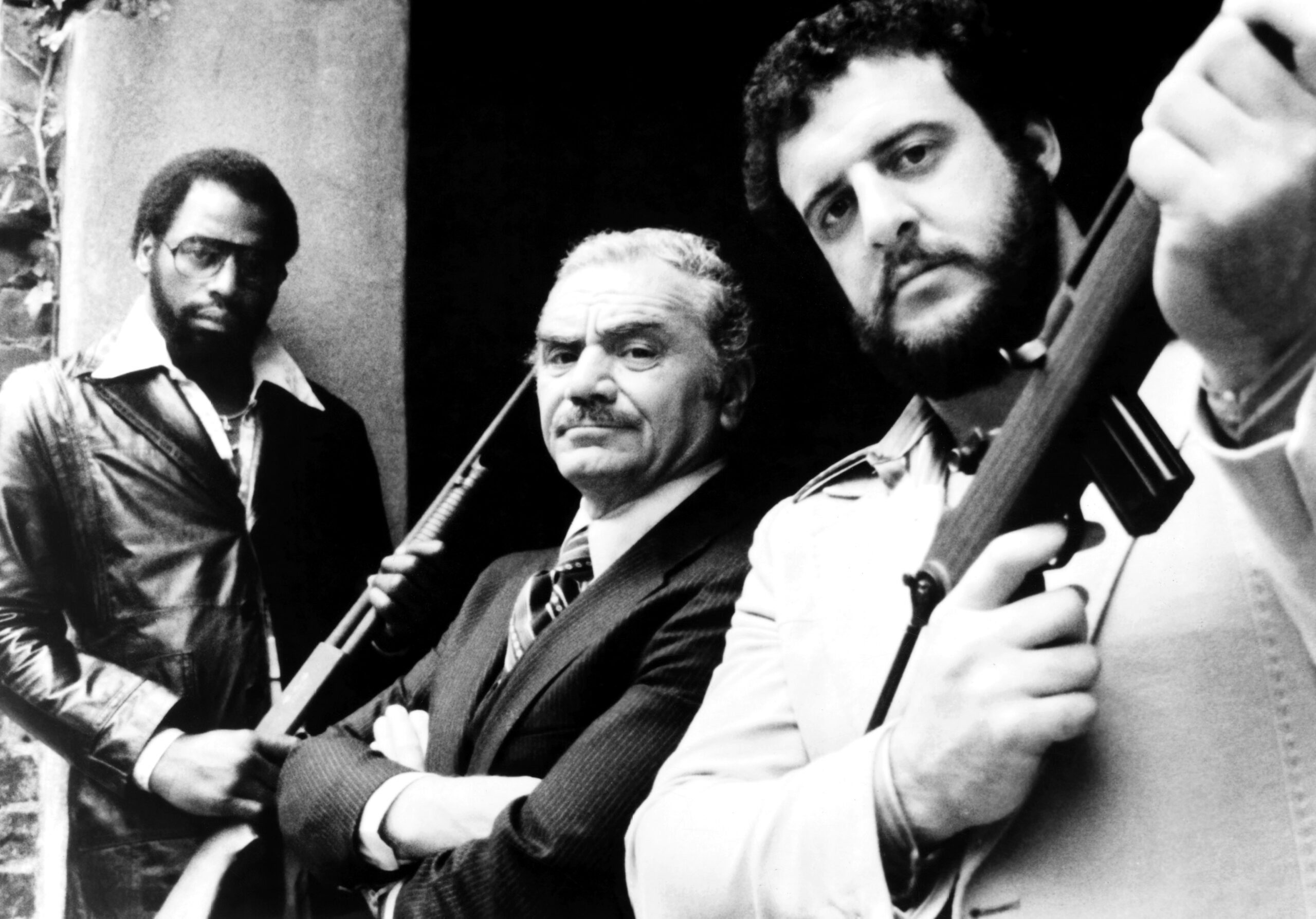 THE DOUBLE McGUFFIN, from left, Ed Jones, Ernest Borgnine, Lyle Alzado, 1979,