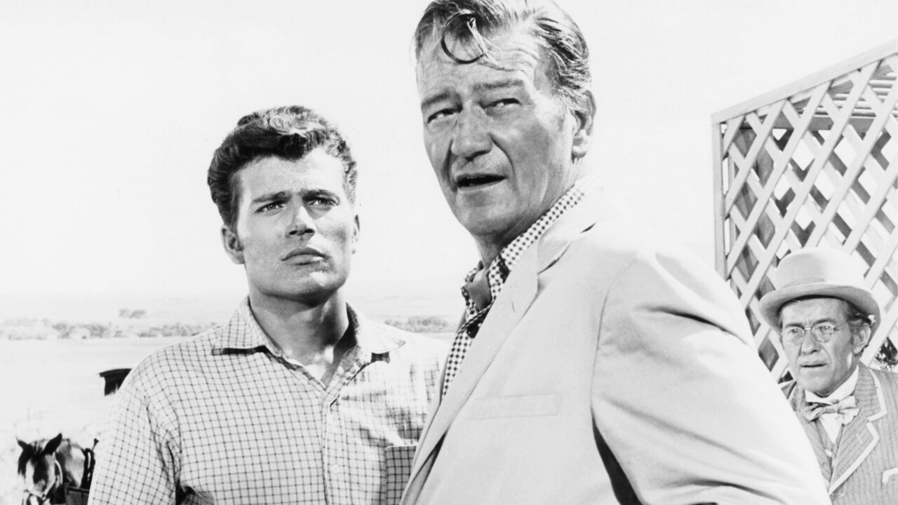 McLINTOCK!, from left, Patrick Wayne, John Wayne, 1963