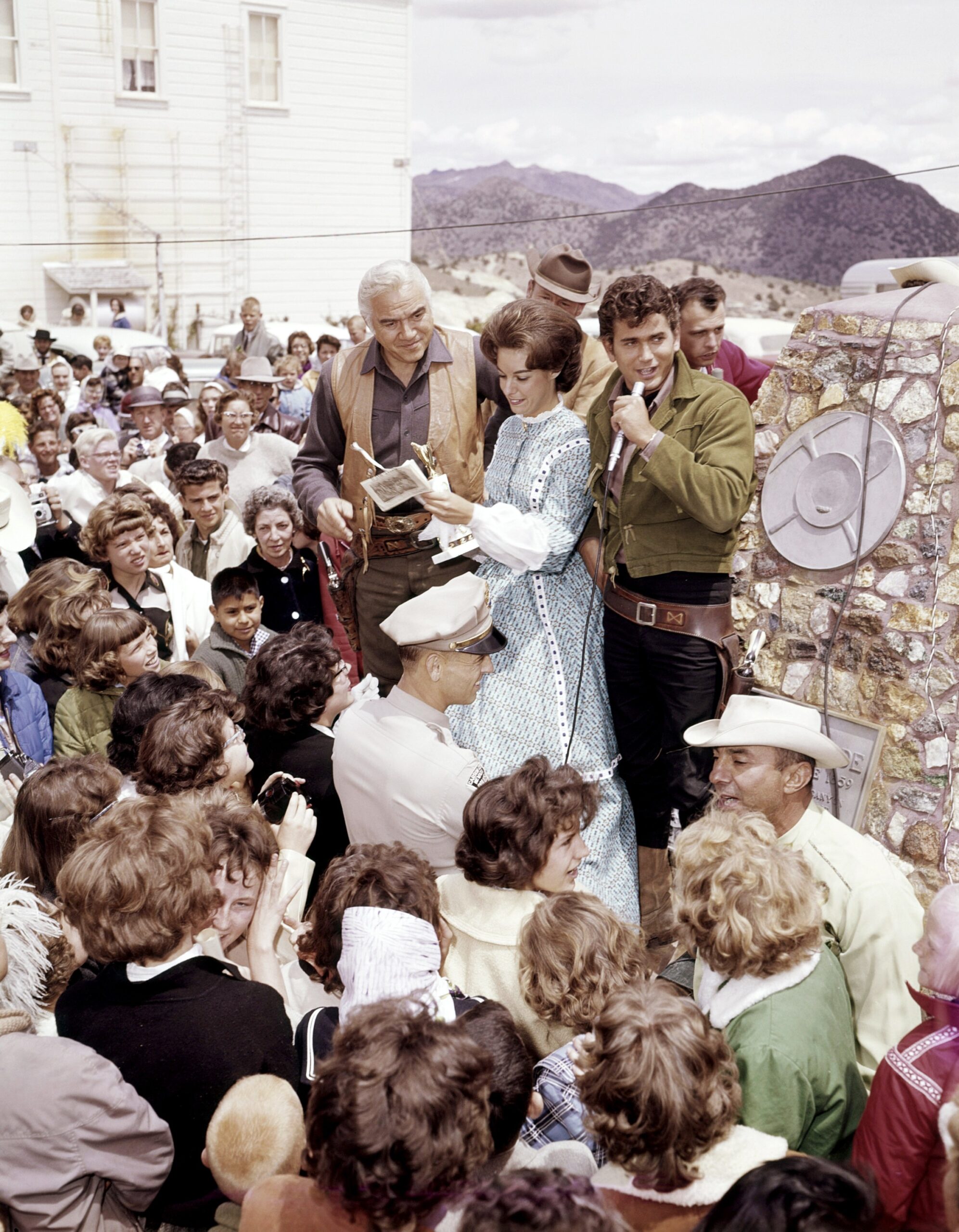 BONANZA, left and right, Lorne Greene, Michael Landon, during a publicity event, ca. early 1960s