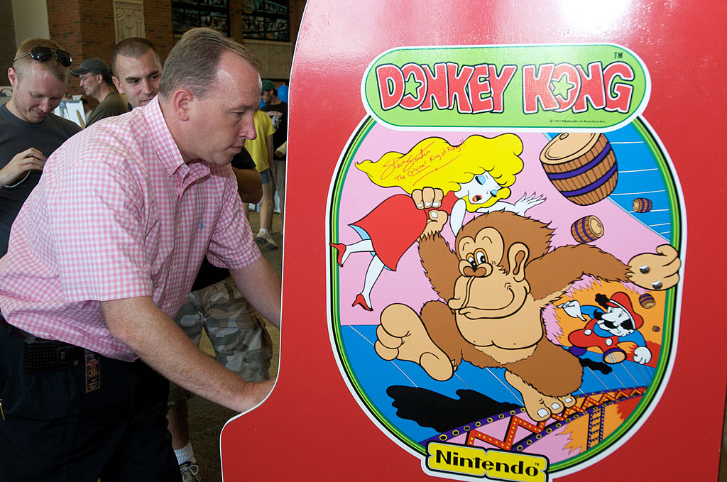 Steve Sanders, 'The Orignal King of Kong,' plays Donkey Kong at the launch party for the International Video Game Hall of Fame and Museum on August 13, 2009 in Ottumwa, Iowa. Ottumwa was officially proclaimed the Video Game Capital of the World at the launch party and plans are underway to build a full museum in the small Iowa city