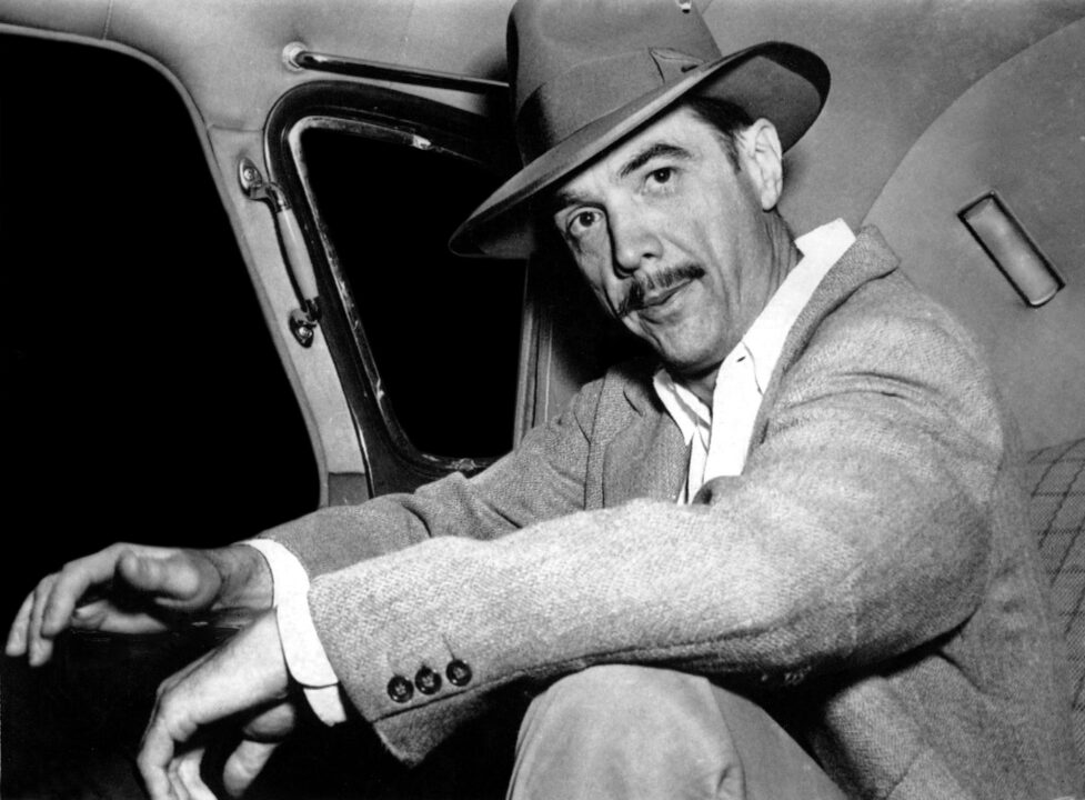 Howard Hughes, wearing 'good luck' hat, 1947