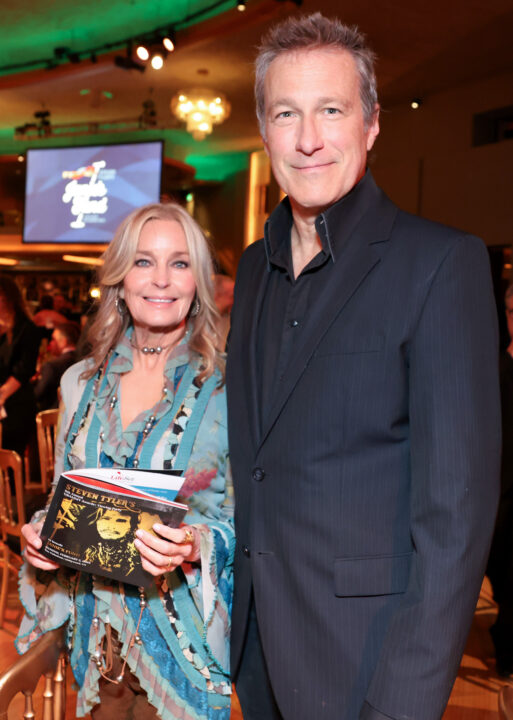 LOS ANGELES, CALIFORNIA - FEBRUARY 02: (L-R) Bo Derek and John Corbett attend the 6th Jam For Janie Grammy Awards Viewing Party Presented By Live Nation at the Hollywood Palladium on February 02, 2025 in Los Angeles, California.