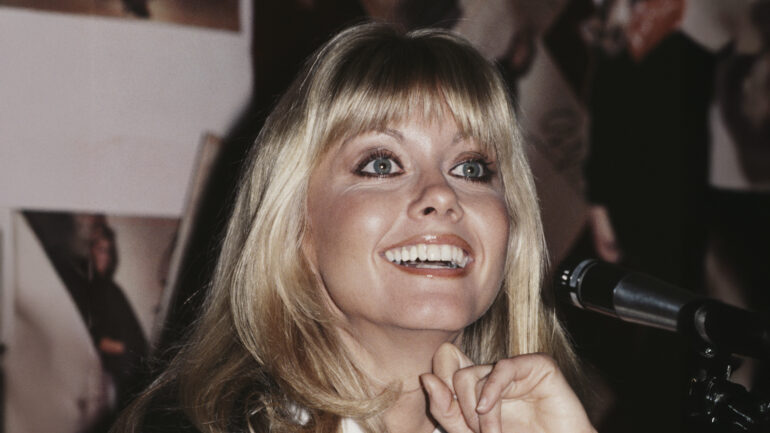 Australian actress and singer Olivia Newton-John holds a press conference at the Inn On The Park, London, UK, 29th November 1978. She is starring in the 1978 film adaptation of the musical 'Grease'.