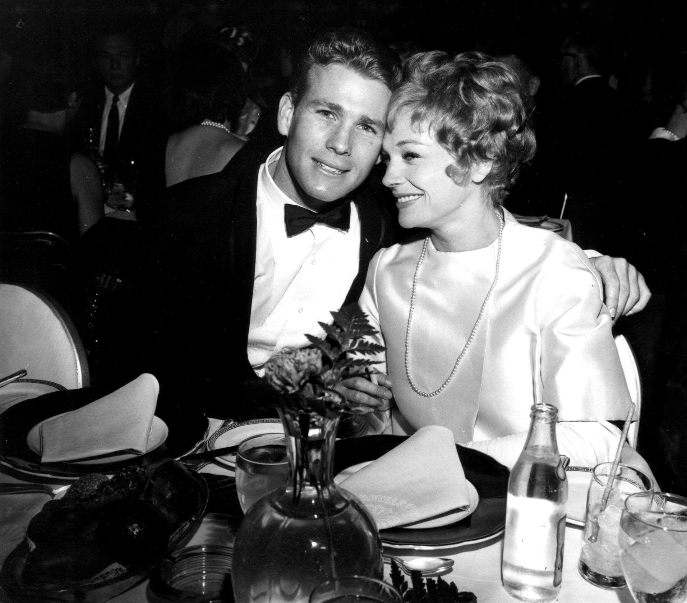 Ryan O'Neal, left, and his first wife, actress Joanna Moore, ca. 1965
