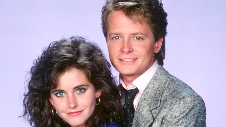 FAMILY TIES, from left: Courteney Cox, Michael J. Fox, (1987), 1982-89.