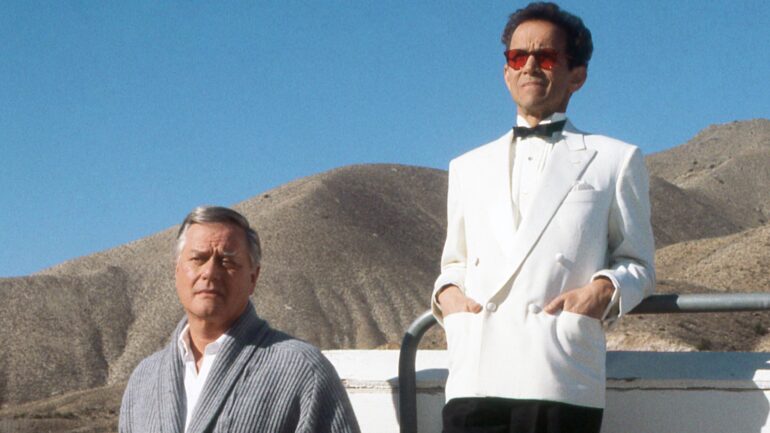 DALLAS, from left: Larry Hagman, Joel Grey, 'Conundrum', (Season 14, ep. 1422, aired May 3, 1991), 1978-91.