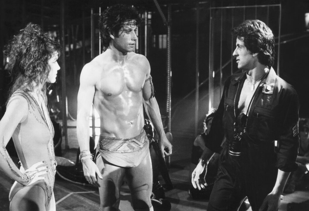 STAYING ALIVE, from left: Finola Hughes, John Travolta, director Sylvester Stallone on set, 1983