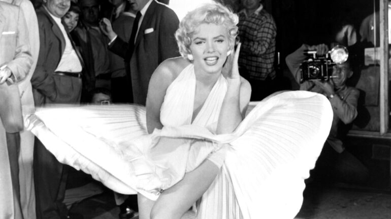 THE SEVEN YEAR ITCH, Marilyn Monroe (in a dress by William Travilla), September 15, 1954. TM & Copyright ©20th Century Fox Film Corp./courtesy Everett Collection