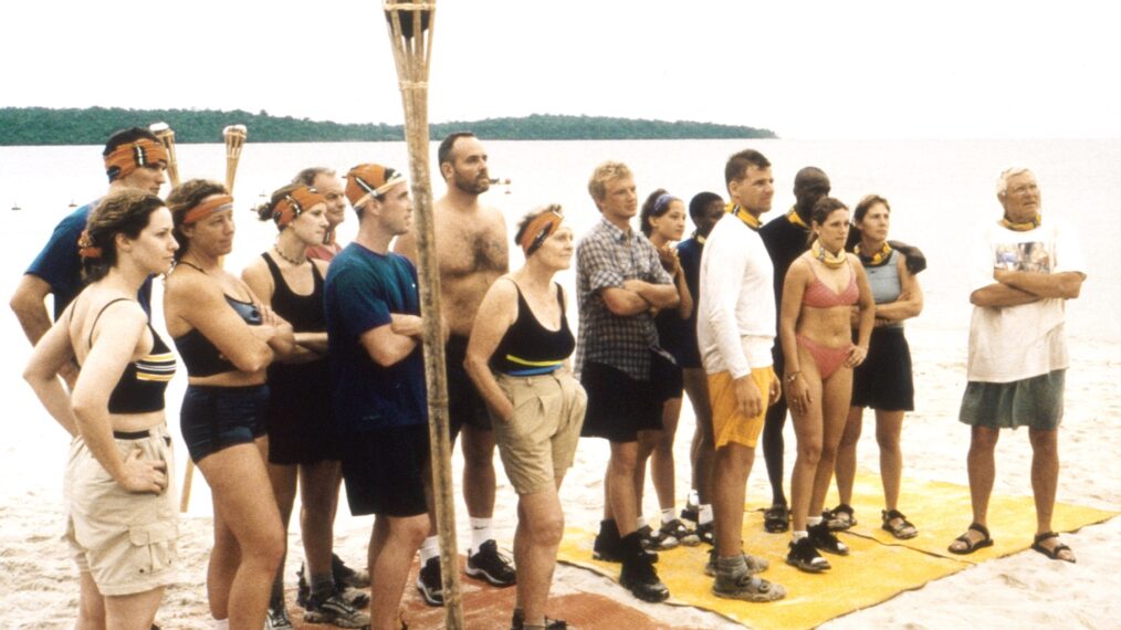 SURVIVOR, (aka SURVIVOR: BORNEO), contestants: Susan Hawk (3rd from left), Rudy Boesch (5th from left - red shirt), Sean Kenniff (6th from left - blue shirt), Richard Hatch (7th from left - shirtless), Sonja Christopher (8th from left - khaki shorts), Greg Buis (8th from right - checkered shirt), Colleen Haskell (7th from right), Ramona Gray (6th from right - obscured), Gervase Peterson (4th from right), Gretchen Cordy (2nd from right), B.B. Andersen (right), (Season 1, premiered May 31, 2000)