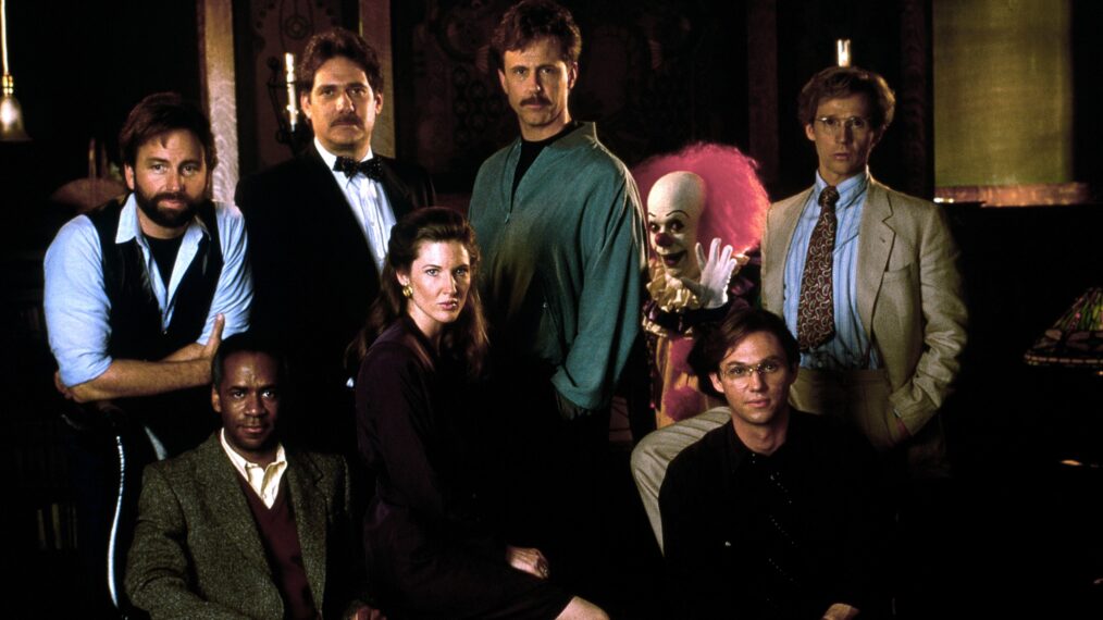 IT, (aka STEPHEN KING'S IT), clockwise from top left: John Ritter, Richard Masur, Harry Anderson, Tim Curry as Pennywise, Dennis Christopher, Richard Thomas, Annette O'Toole, Tim Reid, 1990