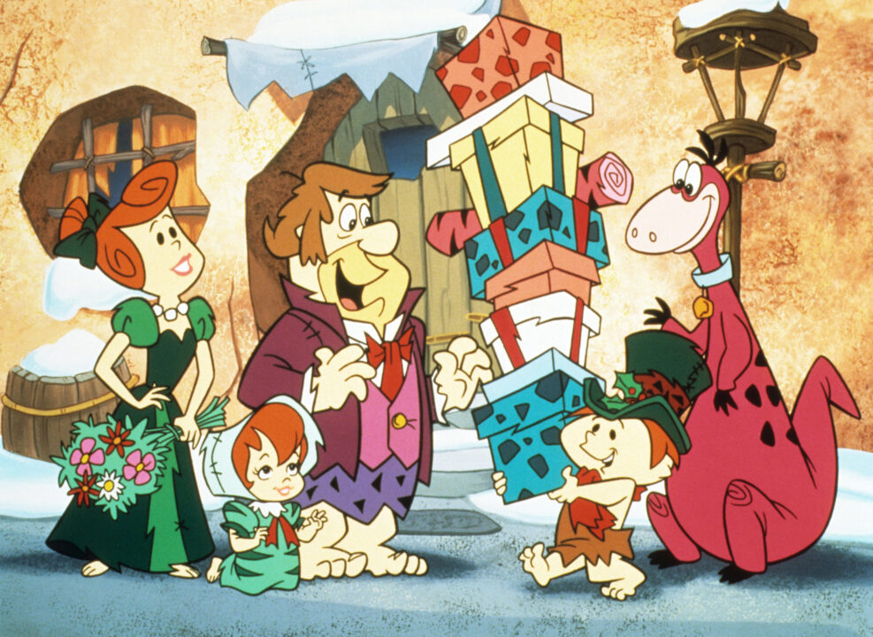 A FLINTSTONES' CHRISTMAS CAROL, (from left): Wilma Flintstone, Peebles Flintstone, Fred Flintstone, 'Boy Who Helps Scrooge', Dino the Dinosaur, 1994. 