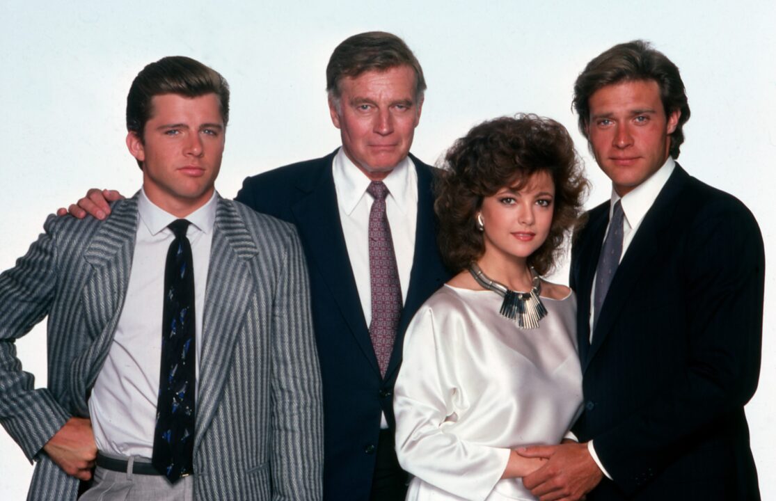 THE COLBYS, from left: Maxwell Caulfield, Charlton Heston, Emma Samms, John James, 1985-1987