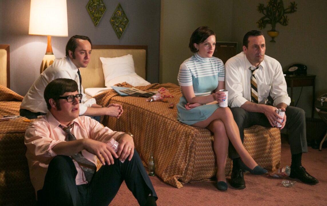 Rich Sommer as Harry Crane, Vincent Kartheiser as Pete Campbell, Elisabeth Moss as Peggy Olson and Jon Hamm as Don Draper - Mad Men _ Season 7, Episode 7 - Photo Credit: