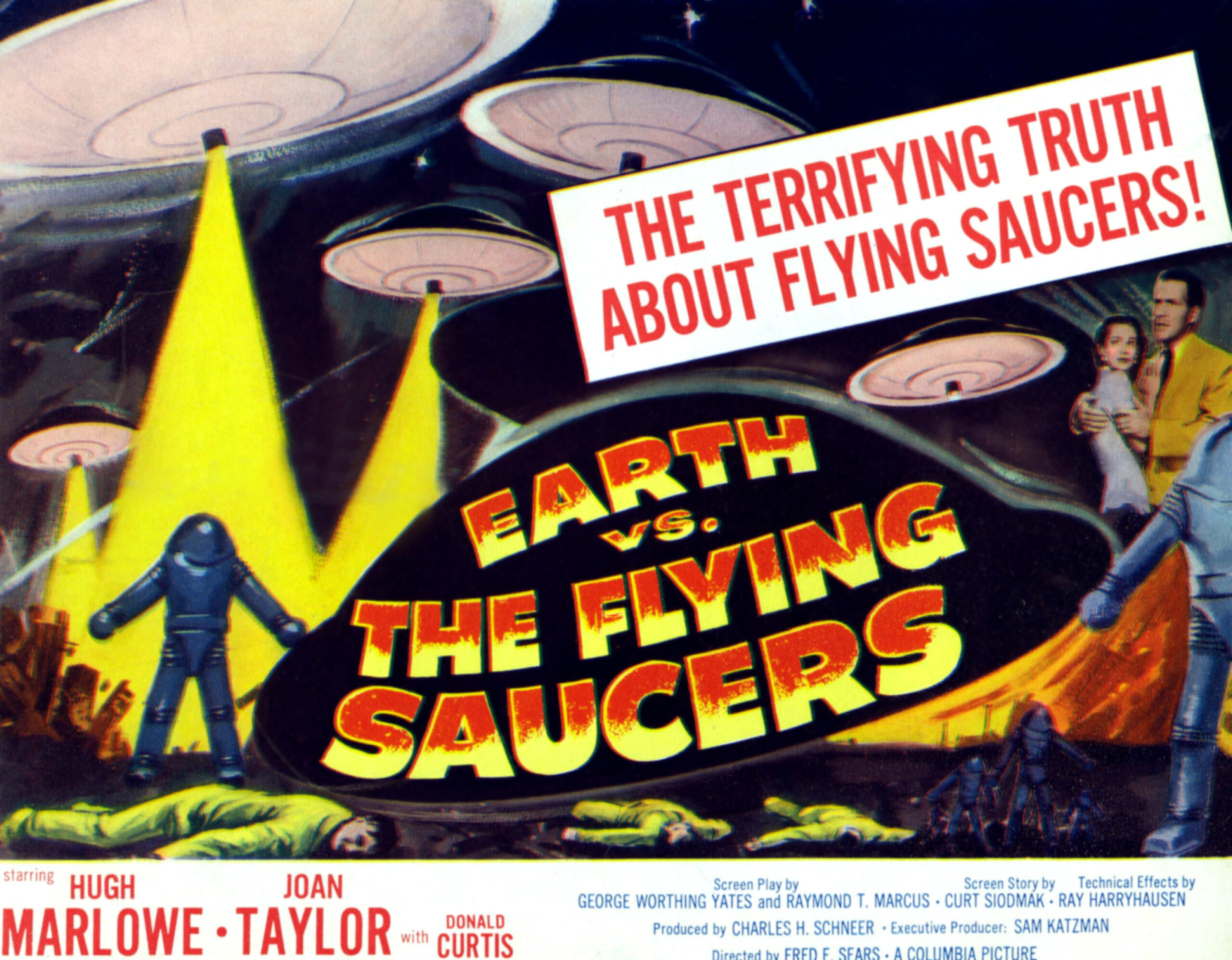 EARTH VS. THE FLYING SAUCERS, far right from left: Joan Taylor, Hugh Marlowe, 1956