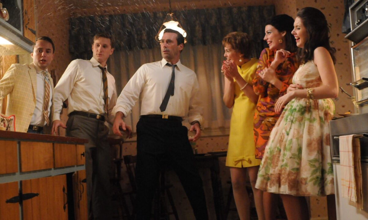 MAD MEN, (from left): Vincent Kartheiser, Aaron Staton, Jon Hamm, Larisa Oleynik, Jessica Pare, Alison Brie, 'Signal 30', (Season 5, ep. 505, aired April 15, 2012), 2007-. photo: Michael Yarish / © AMC / Courtesy: Everett Collection