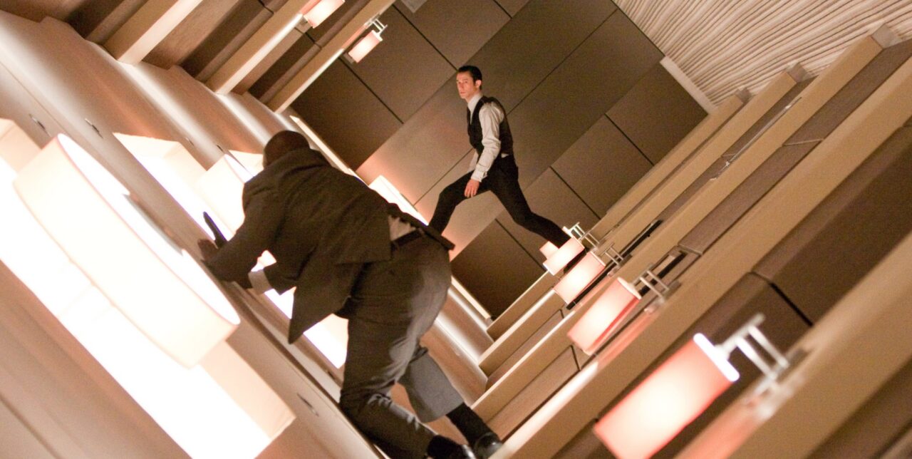INCEPTION, Joseph Gordon-Levitt (back), 2010. ph: Stephen Vaughan/©Warner Bros./Courtesy Everett Collection