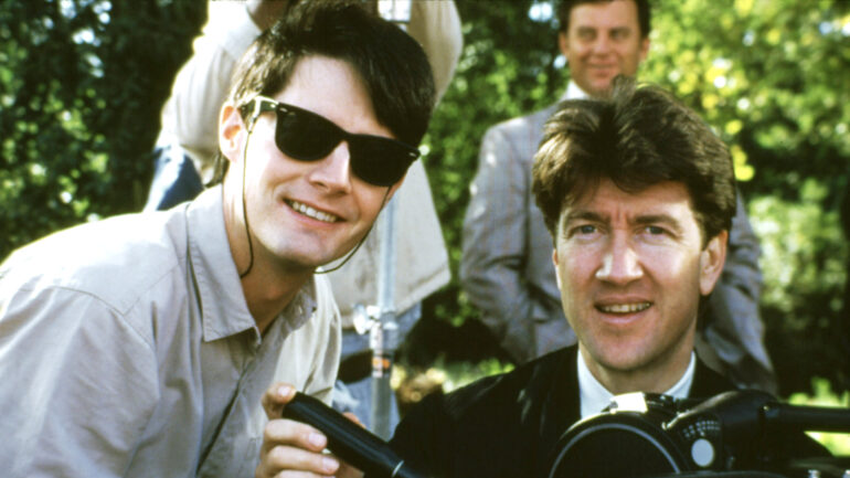 Actor KYLE MacLACHLAN and director DAVID LYNCH during production of BLUE VELVET, 1986